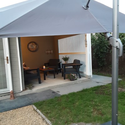 Eindelijk  kunnen  genieten van  onze  verlichte  parasol