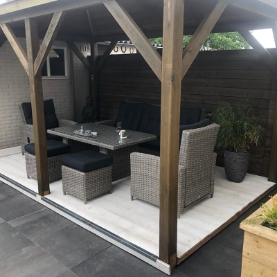 Wij genieten enorm van de tuinset in onze Oosterse tuin